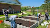 Crown Point Rotary Club plants food pantry garden at Wittenberg Village