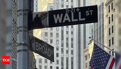 Dow soars to fresh record high, small caps surge on rate cut bets - Times of India