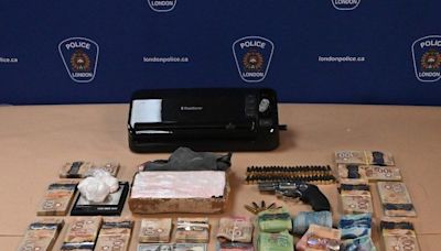 Police seize $210K in cash, 1.1 kg of cocaine, loaded handgun