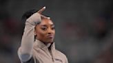 Simone Biles cruises to 9th national title and gives Olympic champ Sunisa Lee a boost along the way