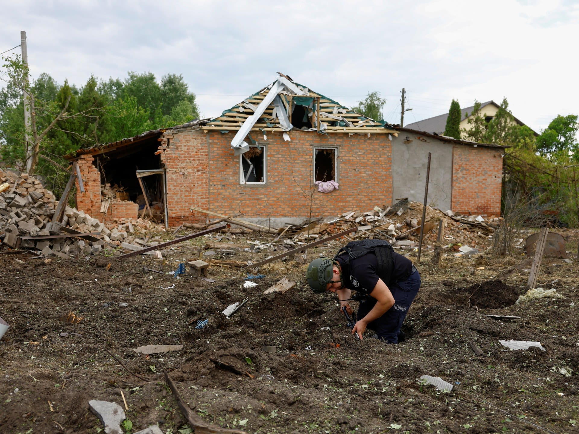 Russian attacks on Ukraine’s Kharkiv region kill at least 11 people