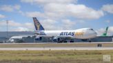 Atlas Air engine that caught fire in Miami had loose plug, NTSB says