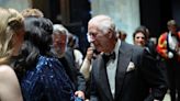 King applauded on Royal Opera House stage hand in hand with performers