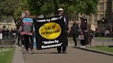 Miners' pension campaigners march at Westminster