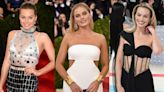 All of Margot Robbie’s Met Gala Dresses: Custom Prada, Floor-length Calvin Klein and More