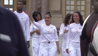 Movie star Salma Hayek Pinault and singer Patrick Bruen join Olympic torch relay at Chateau de Versailles