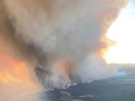 Dozens of blazes burning in Canada are sending smoke to the US. Several major fires have forced hundreds of evacuations