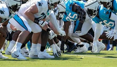 Carolina tries to beef up center position