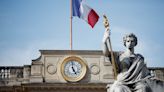 French debt risk premium falls from 12-year high after vote, but investors cautious