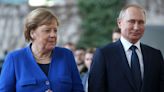 Former German Chancellor Merkel defends her government's move to buy massive amounts of Russian gas, saying she has no regrets as it was right for the time