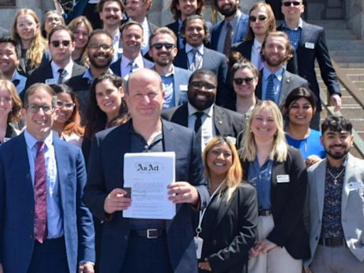 Gov. Jared Polis signs Colorado budget with focus on schools, public safety, housing