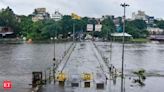 Pune faces severe disruptions amidst heavy rainfall: Schools Closed, Traffic Jams, and Flood Warnings - The Economic Times