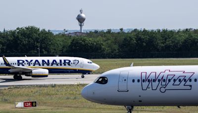 Ryanair quarterly profits dive by nearly half amid weaker fares