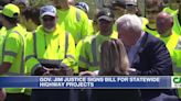 W.Va. Gov. Jim Justice signs bills for highway projects