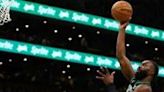 Boston's Jaylen Brown soars over Miami's Tyler Herro as the Celtics completed a 4-1 playoff series victory