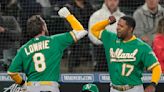 Andrus, Lowrie homer, A's end 13-game skid against Mariners