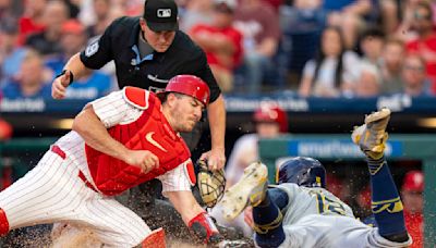 Hoskins homers in return to Philly, but Dahl goes deep in Phillies debut to key 3-1 win over Brewers