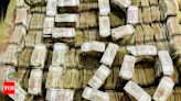 Bhola drug case: Rs 3.5 cr seized in ED searches at Jalandhar and other places in Punjab | India News - Times of India