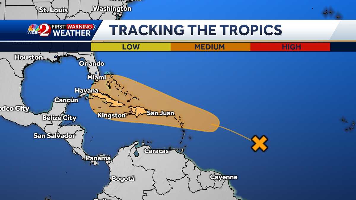 National Hurricane Center tracking tropical disturbance moving west