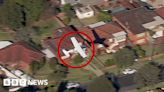 Light plane glides near homes before crash landing in Australia