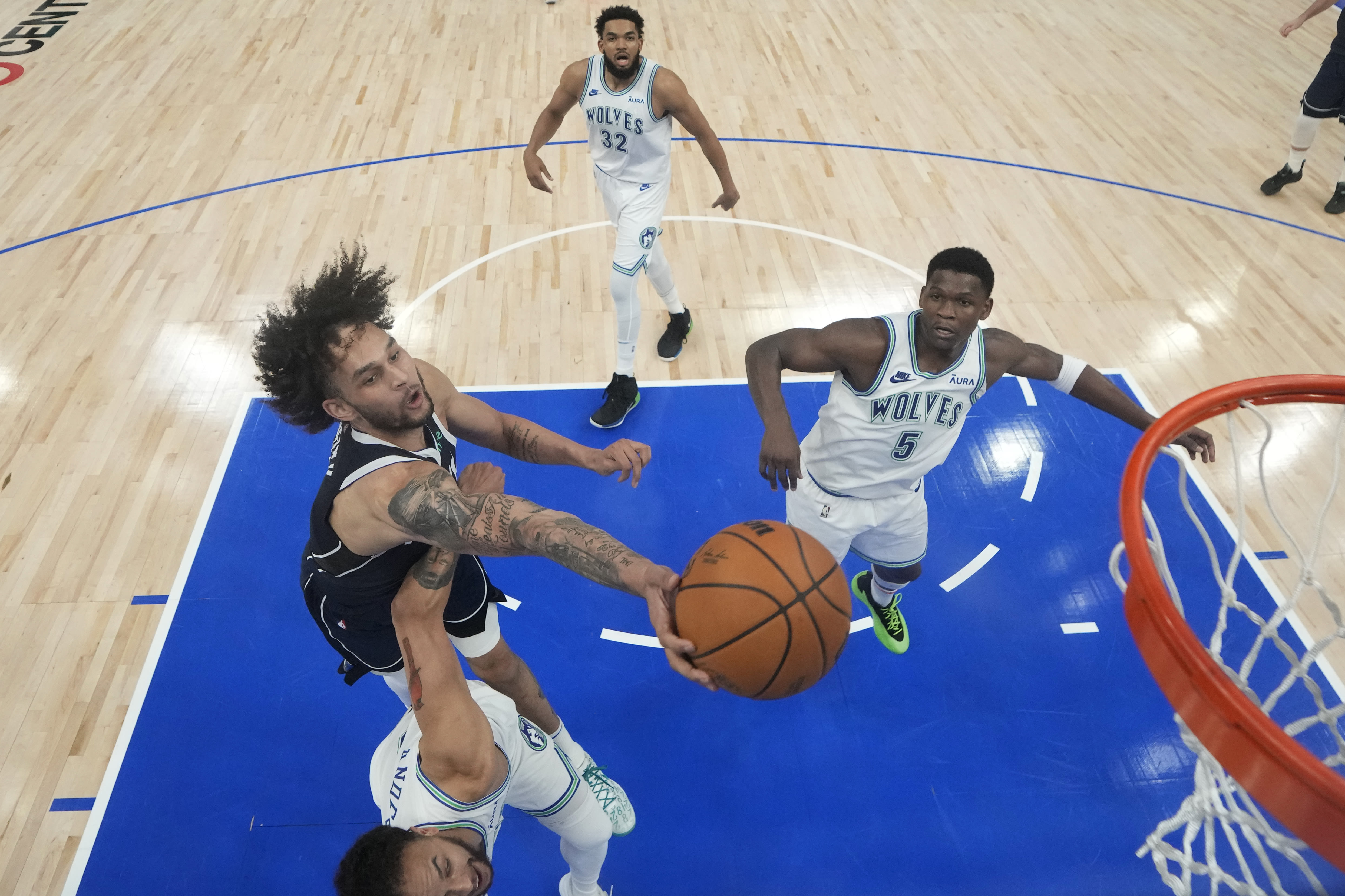 Mavericks stand tall against Timberwolves with big effort around the rim