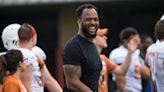 Golden: Unpaid but not undervalued Derrick Johnson mentoring Texas defensive players