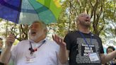 United Methodist delegates repeal their church’s ban on its clergy celebrating same-sex marriages