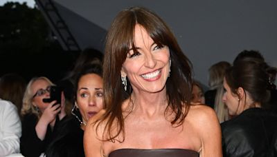 Davina McCall, 56, turns heads in a brown leather dress