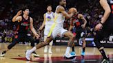 Warriors put clamps on Heat