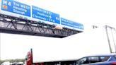 Just Stop Oil demonstrators climb motorway signs in climate protest