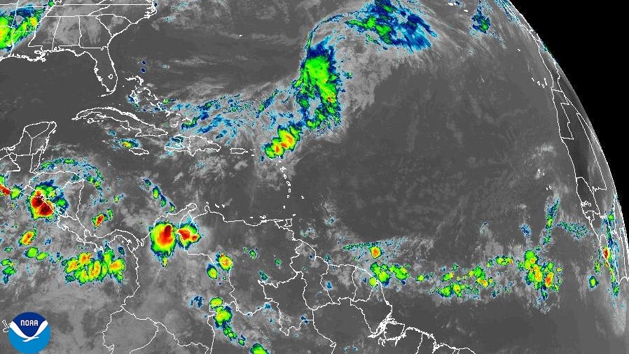 National Hurricane Center tracking 3 tropical waves as heavy rain hits portions of Caribbean