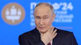 Putin urges major expansion of Russian financial markets, cutting use of Western currencies