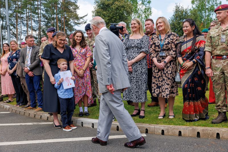 I’ve been allowed out of my cage, King Charles jokes during visit