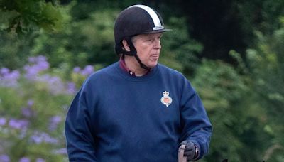 Prince Andrew is seen horse riding around Windsor Castle