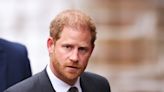 Harry under fire as he fails to attend first day of phone hacking trial