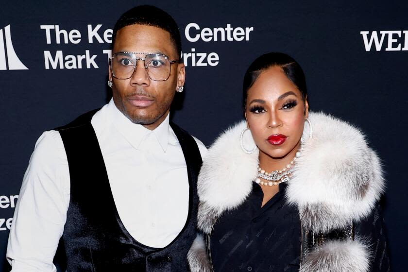 Ashanti and Nelly, awaiting their first kid, actually married a lil bit (six months) ago