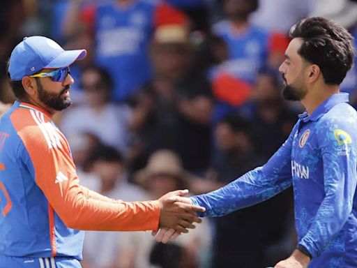 'Bambai se aaya...': Rashid Khan shares photo with Rohit Sharma after Afghanistan enter semifinals | Cricket News - Times of India