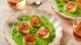 Serve seared scallops on a creamy herb sauce for a quick, elegant meal
