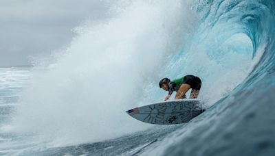 Simmers claims world surfing title for California, Hawaii's Florence wins his third