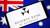 Australia's central bank says policy is restrictive, causing households pain