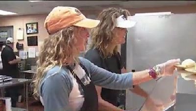 Olympic gold medalists Brooke Bennett and Michele Smith help feed homeless in Clearwater