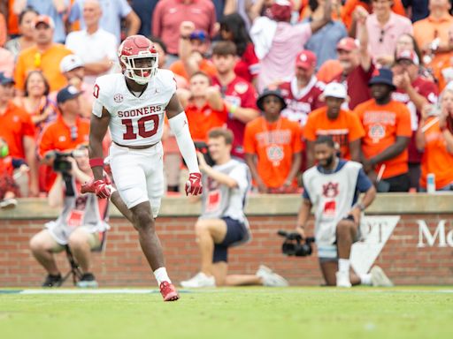 No. 21 Oklahoma gets pick 6 from Kip Lewis to finish comeback win over Auburn