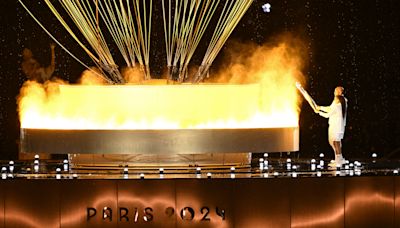 2024 Paris Olympics Opening Ceremony: Flying Olympic flame soars above Paris as Celine Dion wows crowds