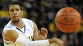 Former Michigan basketball star dies at 33