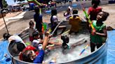 The People's Plaza puts the smackdown on a week's record spring heat with Balloon Battle