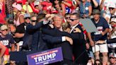 Trump arrives in Milwaukee for RNC as country grapples with assassination attempt