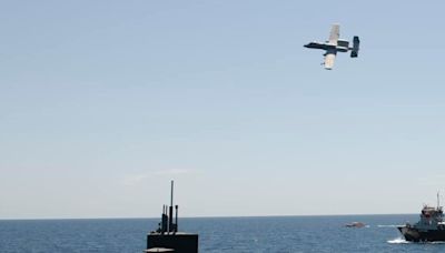 Unusual photos show A-10 attack aircraft built to hunt tanks escorting a ballistic missile submarine