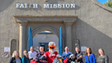 Union Square Credit Union donates coats to Faith Mission