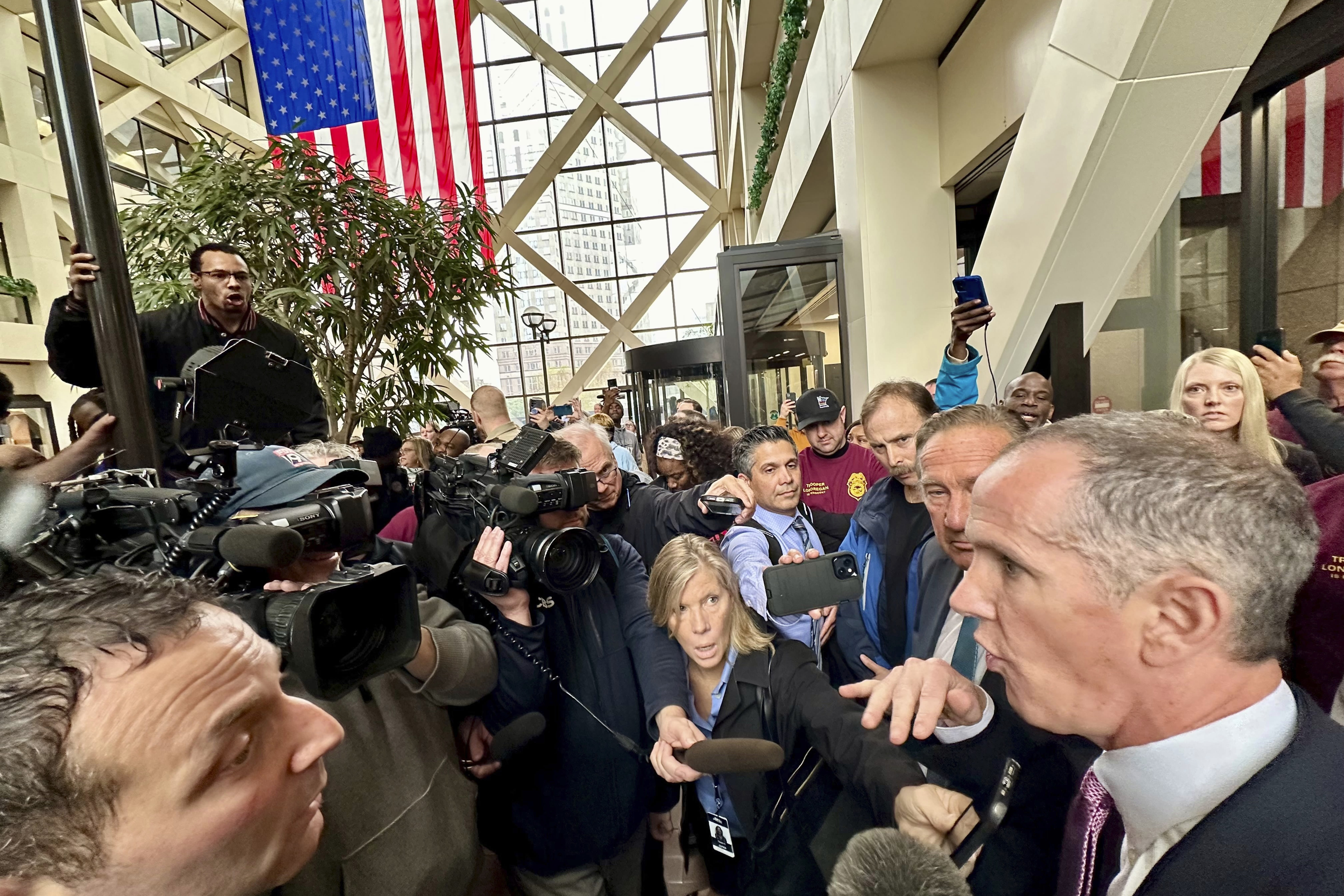 Supporters, opponents of Minnesota trooper charged with murder confront each other at courthouse