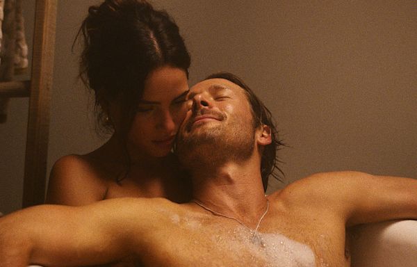 Adria Arjona Says She and Glen Powell Filmed ‘Hit Man’ Sex Scenes in Pain From ‘Crazy’ Rashes